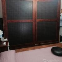 camera da letto stile etnico in vero legno