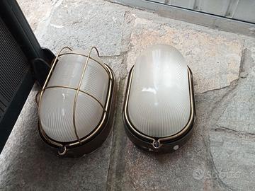 Faretti dorati e applique stile navale