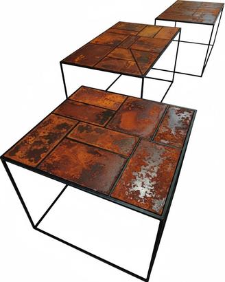 tavolo design con top in ferro ossidato