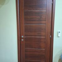 Porta in legno massello Garofoli con maniglia Oliv