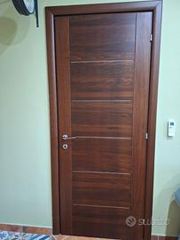 Porta in legno massello Garofoli con maniglia Oliv