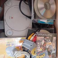 PlayStation One con giochi 