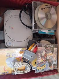 PlayStation One con giochi 