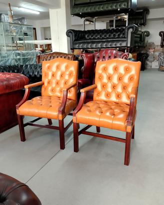 Coppia di poltrone chesterfield director tabacco 
