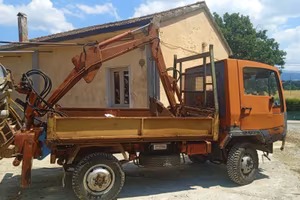 Omai 4x4 con escavatore