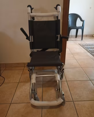 Sedia a rotelle da transito