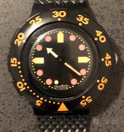 Marca: Swatch. Accessorio: Scuba Barrier Reef