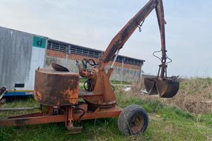 Trattore carica letame