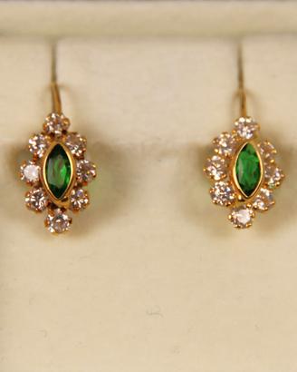 Orecchini in oro giallo 750 con smeraldi.