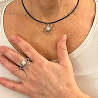 Set gioielli acciaio inox collana fiore e anello