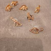 Lotto spille vintage dorate dinosauri