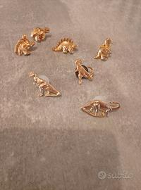 Lotto spille vintage dorate dinosauri