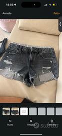 Pantaloncini neri strappati