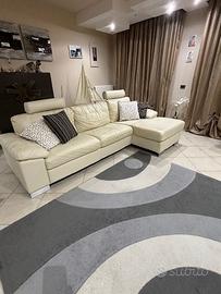 Divano in pelle con chaise longue