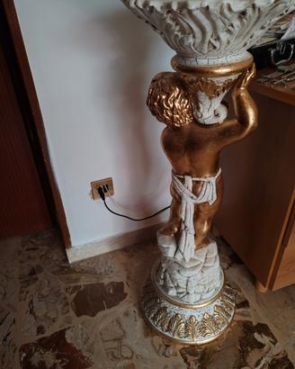 statua 
