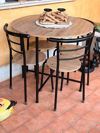 tavolo rotondo da pranzo con sedie