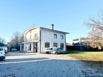 Graziosa casa singola con officina a reddito garan