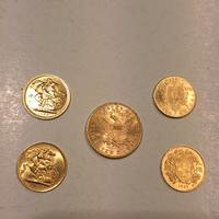 Dollaro sterline e marenghi  in oro