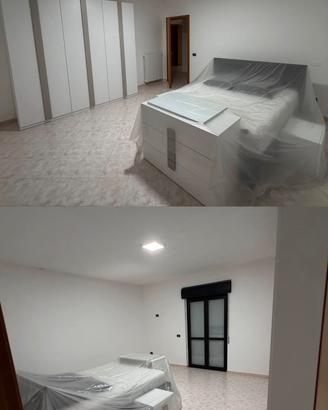 Camera da letto completa moderna