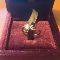Anello oro 18kt con diamante e zaffiro. 