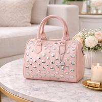 Bauletto Coconuda con borchie