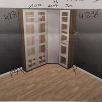 Armadio Ikea angolare con specchio.