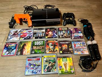 PS3 fat+2 joypad +2 mic+2  move+Eyes+Gun+15 Giochi