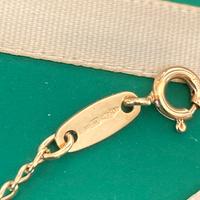 Bracciale e spilla oro 18k