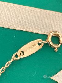 Bracciale e spilla oro 18k
