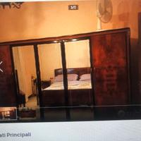 MOBILI CAMERA LETTO IN RADICA DI NOCE