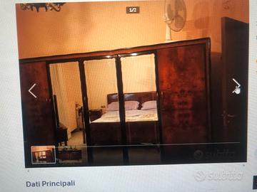 MOBILI CAMERA LETTO IN RADICA DI NOCE