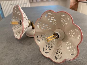Coppia di applique in ceramica