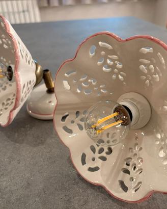 Coppia di applique in ceramica