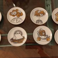 Fornasetti 8 piattini serie "Monete"