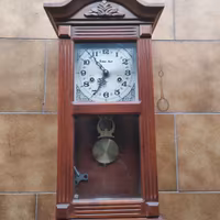 orologio a pendolo a carica 