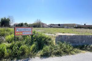 TERRENO IN PARTE ASFALTATO QUALE PARCHEGGIO ED IN