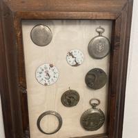 Quadro con orologi antichi