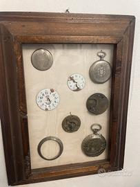 Quadro con orologi antichi