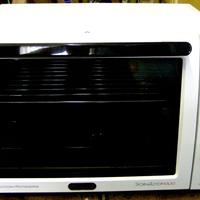 Maxiforno ventilato con girarrosto DE Longhi