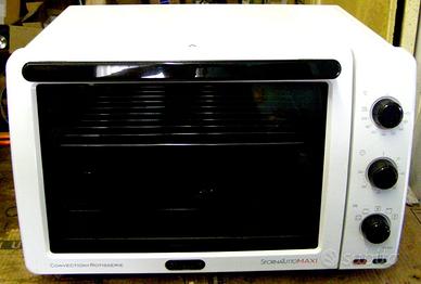 Maxiforno ventilato con girarrosto DE Longhi