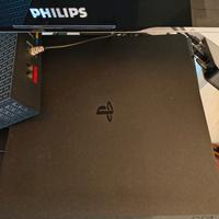 PlayStation 4 Slim completa di joypad e giochi