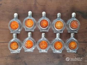 Serie di 10 bottigliette con cammeo di argento