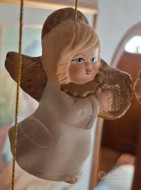 Scacciapensieri vintage con volo di angeli