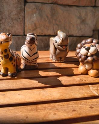 Thun giraffa, elefante, zebra e leone