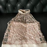 Top in paillettes di Pinko color rosa cipria