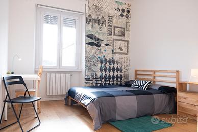 Stanza matrimoniale e balcone privato MetroC MIRTI