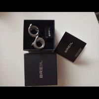 Orecchini nuovi con cartellino timbro rivenditore,