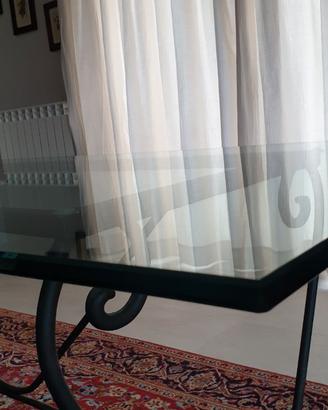 Tavolo in cristallo con base in ferro battuto