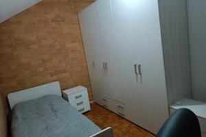 Stanza singola in casa condivisa