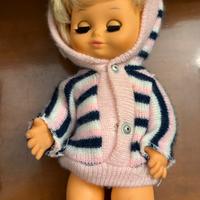 Bambola vintage con vestito